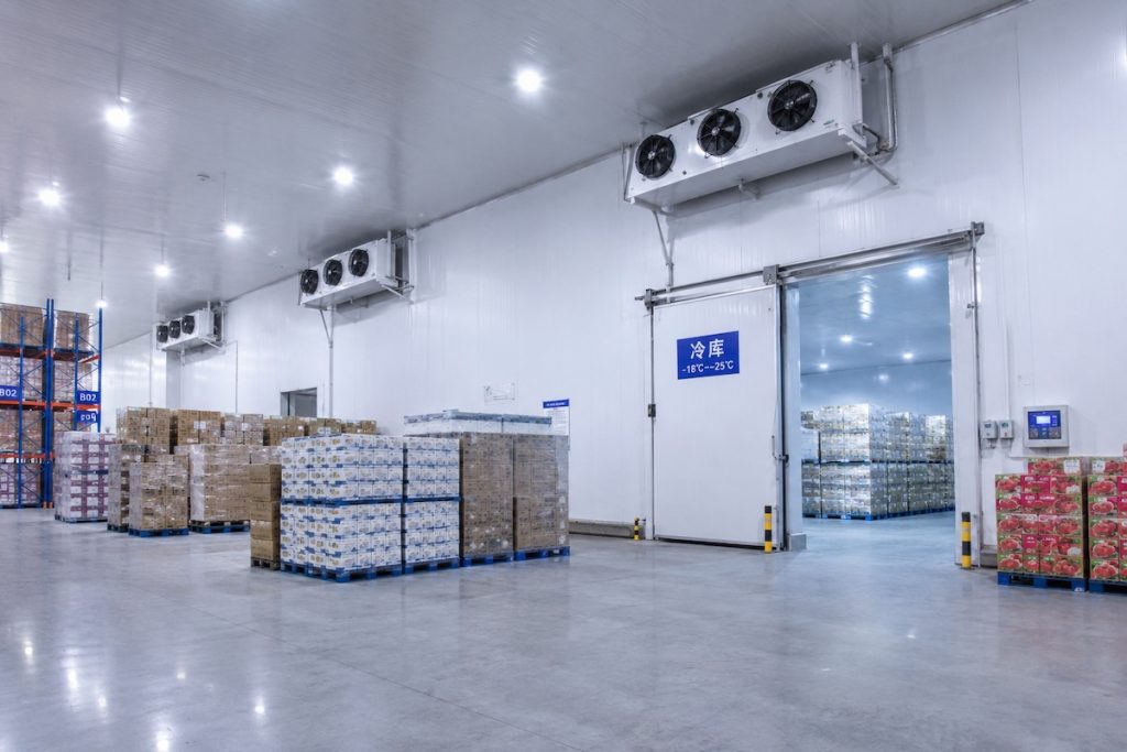 Large constant temperature cold storage warehouse for bulk pickled cucumber storage, ensuring long-term freshness for global export shipment.